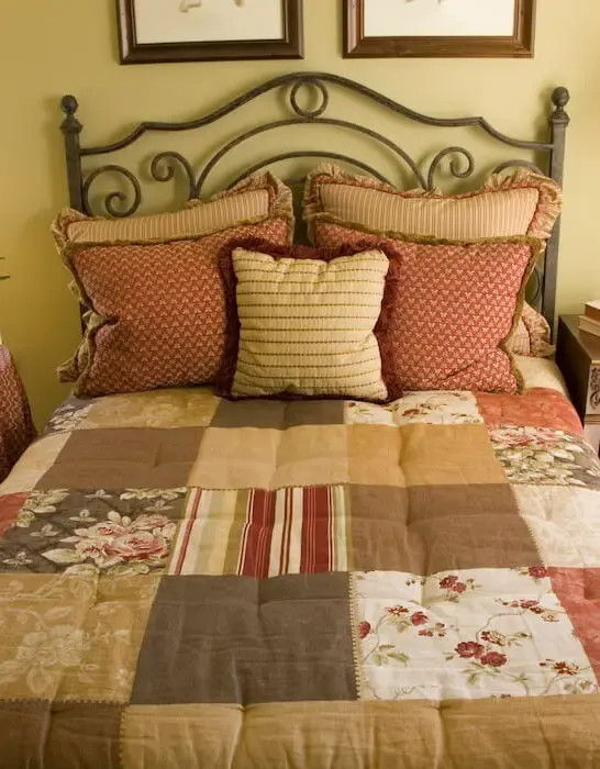 bedroom with quilted cover