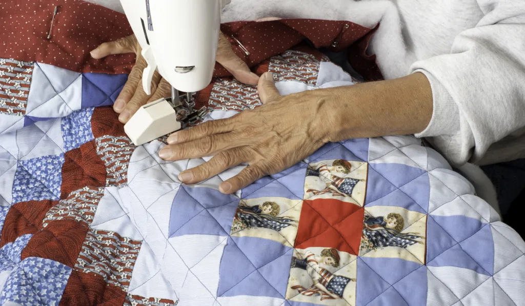 A woman machine quilting