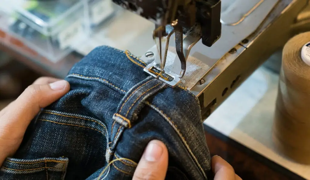 Sewing denim jeans with sewing machine