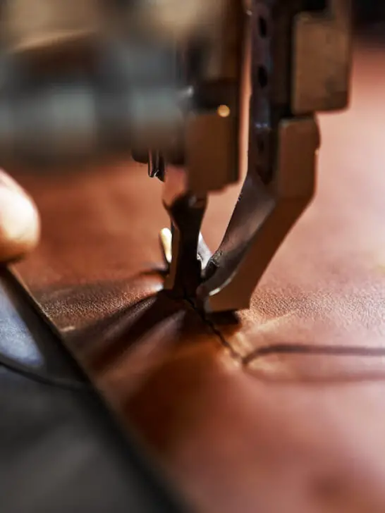 sewing machine being used on leather