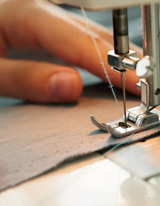 sewing machine being used