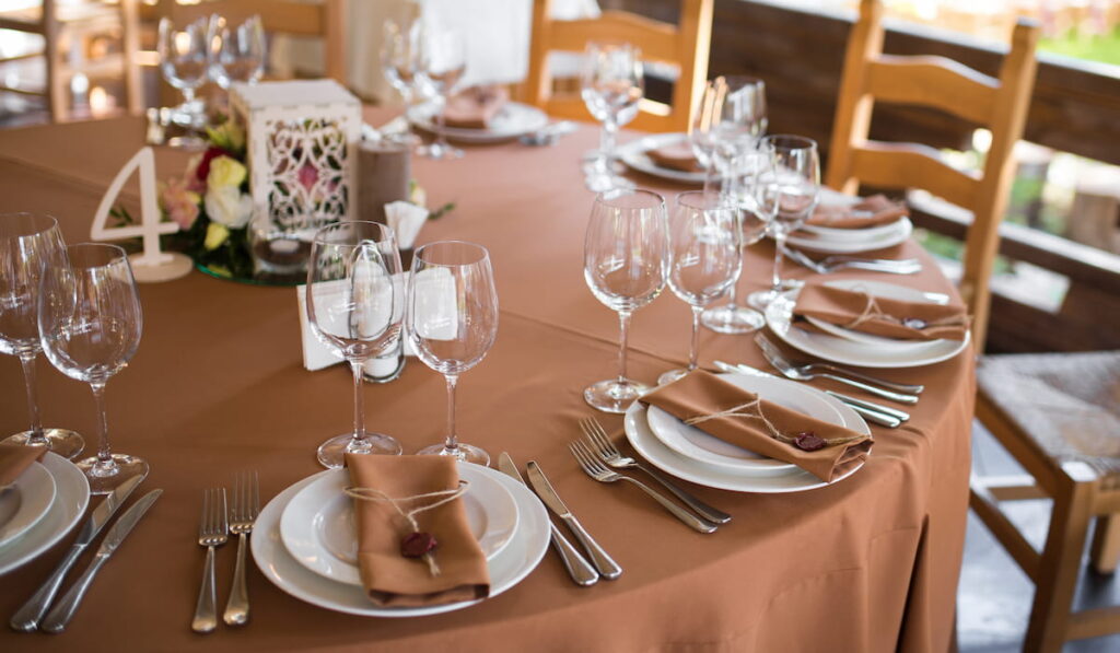 decorated table with brown table cloth 