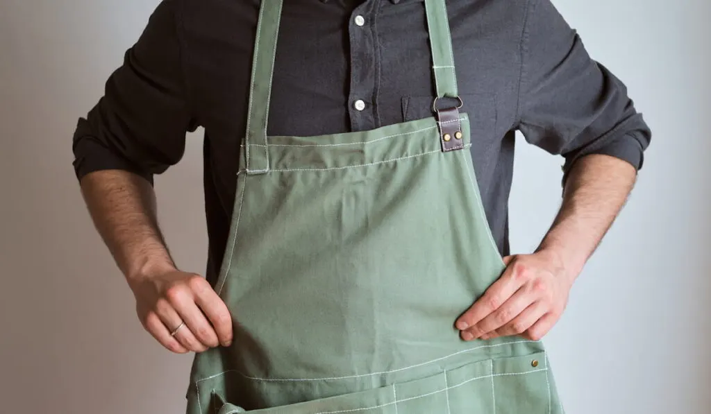 man in a kitchen apron 