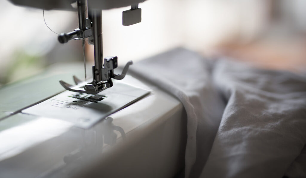 Sewing machine and white fabric
