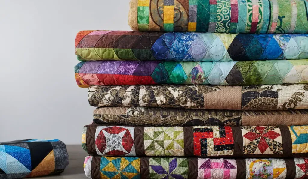 folded colorful quilt
