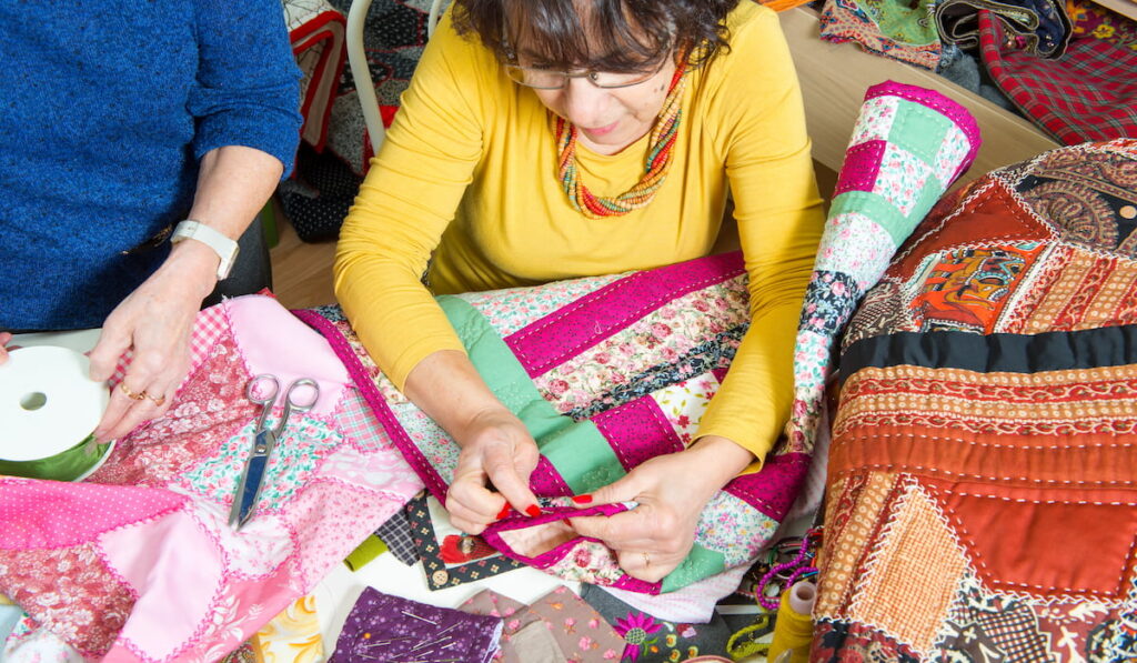 two women working on their patchwork