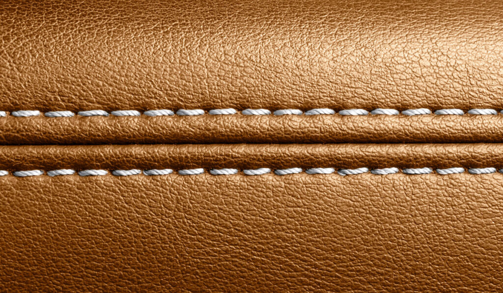 brown leather with stitching 