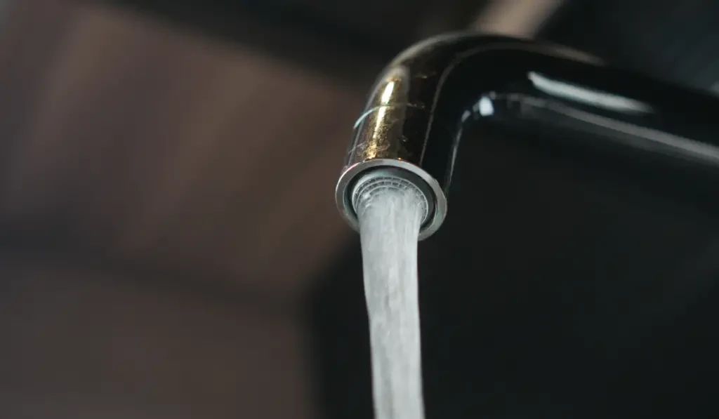 open faucet with running water